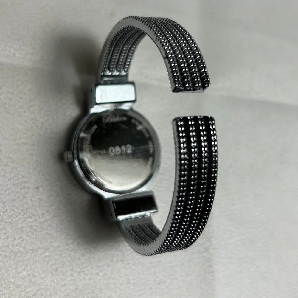 Blekon Woman's Watch Silver Tone Stainless Steel Back Hinged Needs Battery